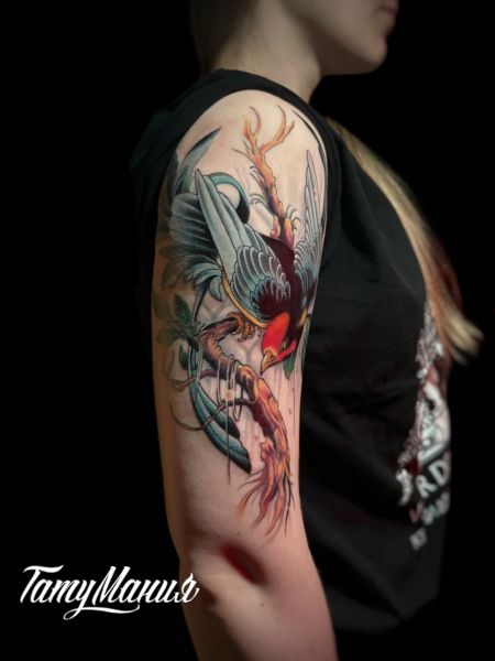 Татуировка птица на ветке