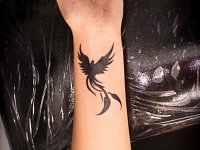 Тату феникс