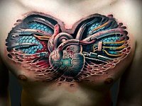 Тату сердце в стиле биомеханика