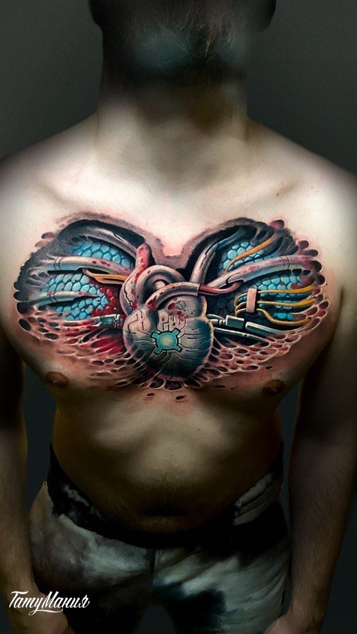 Тату сердце в стиле биомеханика