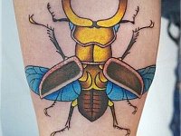 Татуировка жук