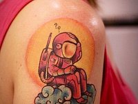 Тату космонавт