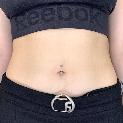 Пирсинг прокол пупка