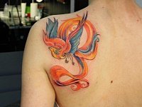 Тату цветная птица счастья