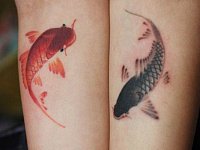 Тату рыбы инь и ян