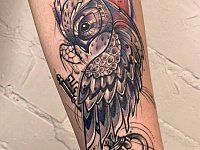 Тату сова с ключом