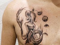 Тату козерог на груди