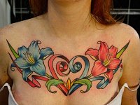 Тату цветы на груди