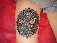 татуировка сова на ноге