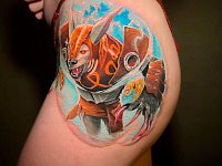 Тату оборотень на бедре