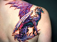 Тату дракон на лопатке