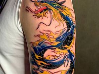 Татуировка китайский дракон на плече