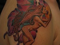 Татуировка девушка с крыльями