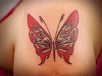 Женская татуировка бабочка