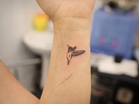 Татуировка птичка