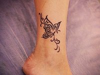 Тату бабочка на голеностопе