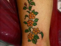 тату цветы на лодыжке