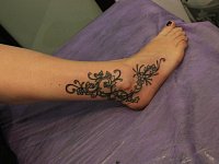 татуировка узор на ноге