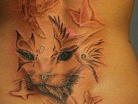 Женская тату мордочка кошки