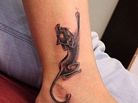 Небольшая тату кошка