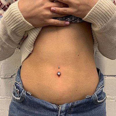 Пирсинг пупка для девушек