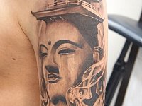 Татуировка будда