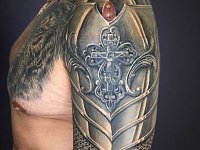 Тату доспехи на плече