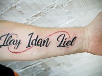 татуировка надпись на предплечье