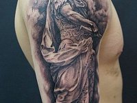 Тату скульптура