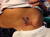 Тату девушка с крыльями