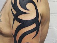 Тату трайбл на руке