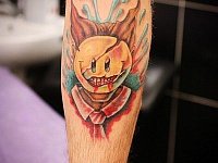 Татуировка страшный смайл