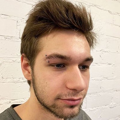 Пирсинг бровей для парней