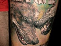 Тату волки с надписью