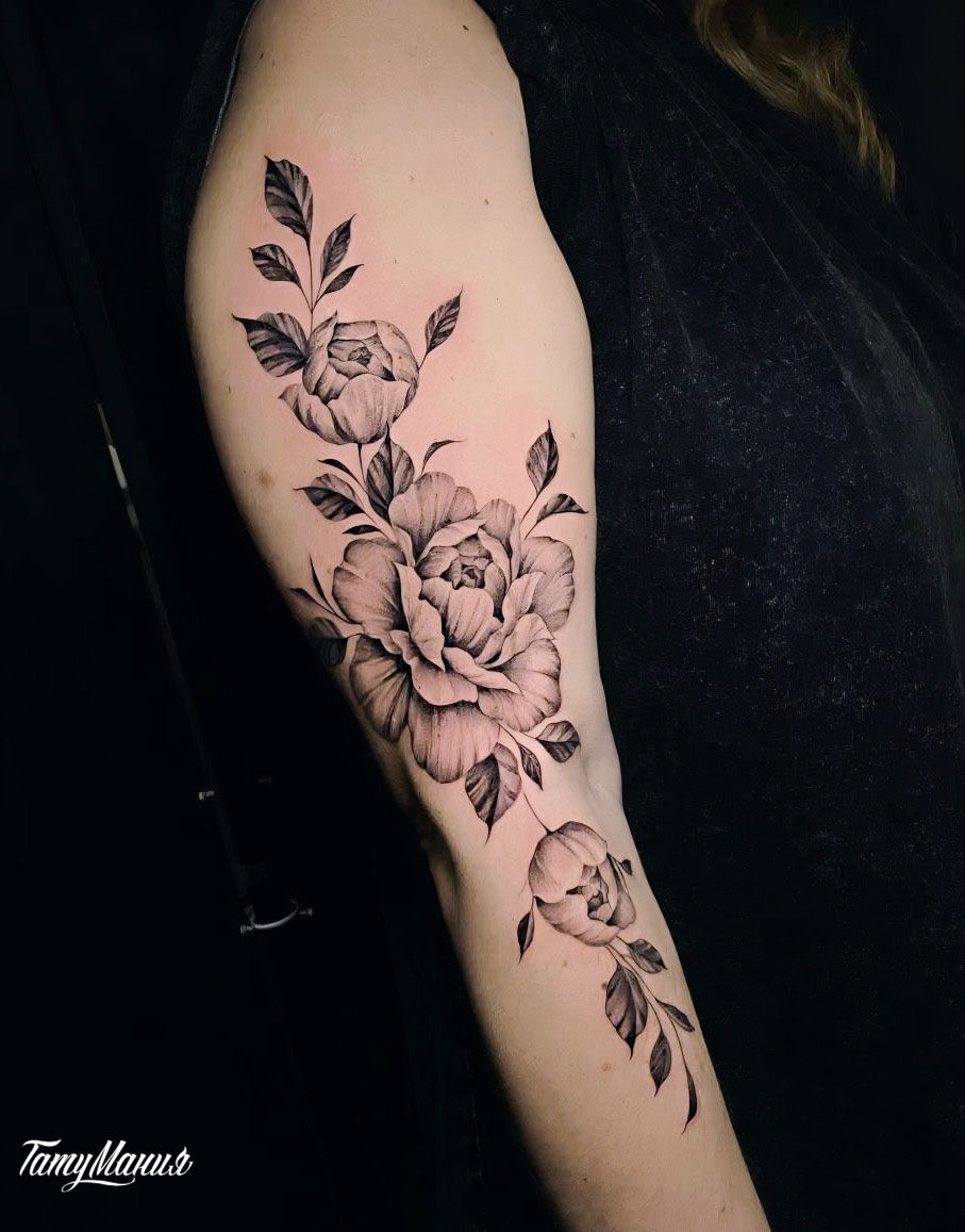 Татуировка розы на руке