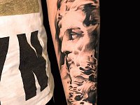 Тату Посейдон на предплечье