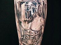 Тату спартанец на икре