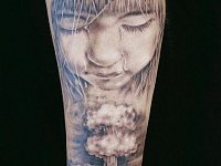 Тату лицо над взрывом