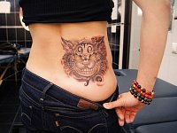 Татуировка чеширский кот