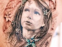 Тату портрет девушки на спине