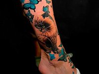 Тату кот с бабочками