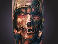 Тату портрет на икре