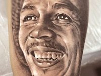тату портрет Боба Марли