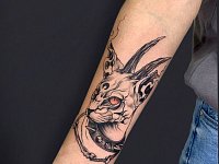 Тату демонический кот