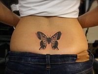 Татуировка на пояснице бабочка