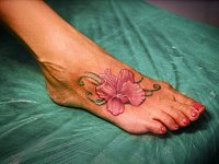 Тату цветок на стопе