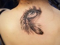 тату глаз на спине