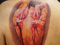 Тату ангел на лопатке