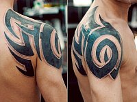 Тату трайбл на плече