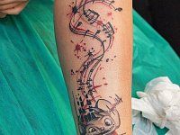 Тату музыкальный кот трешполька